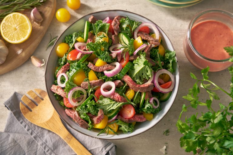 Grilled beef salad with mediterranean herbs and fresh veggies grilled beef salad topshot